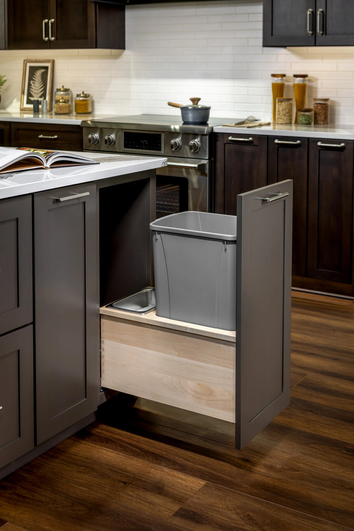 12" Cascade Series Bottom Mount Waste Container, 34 Quart Gray installed in a kitchen cabinet