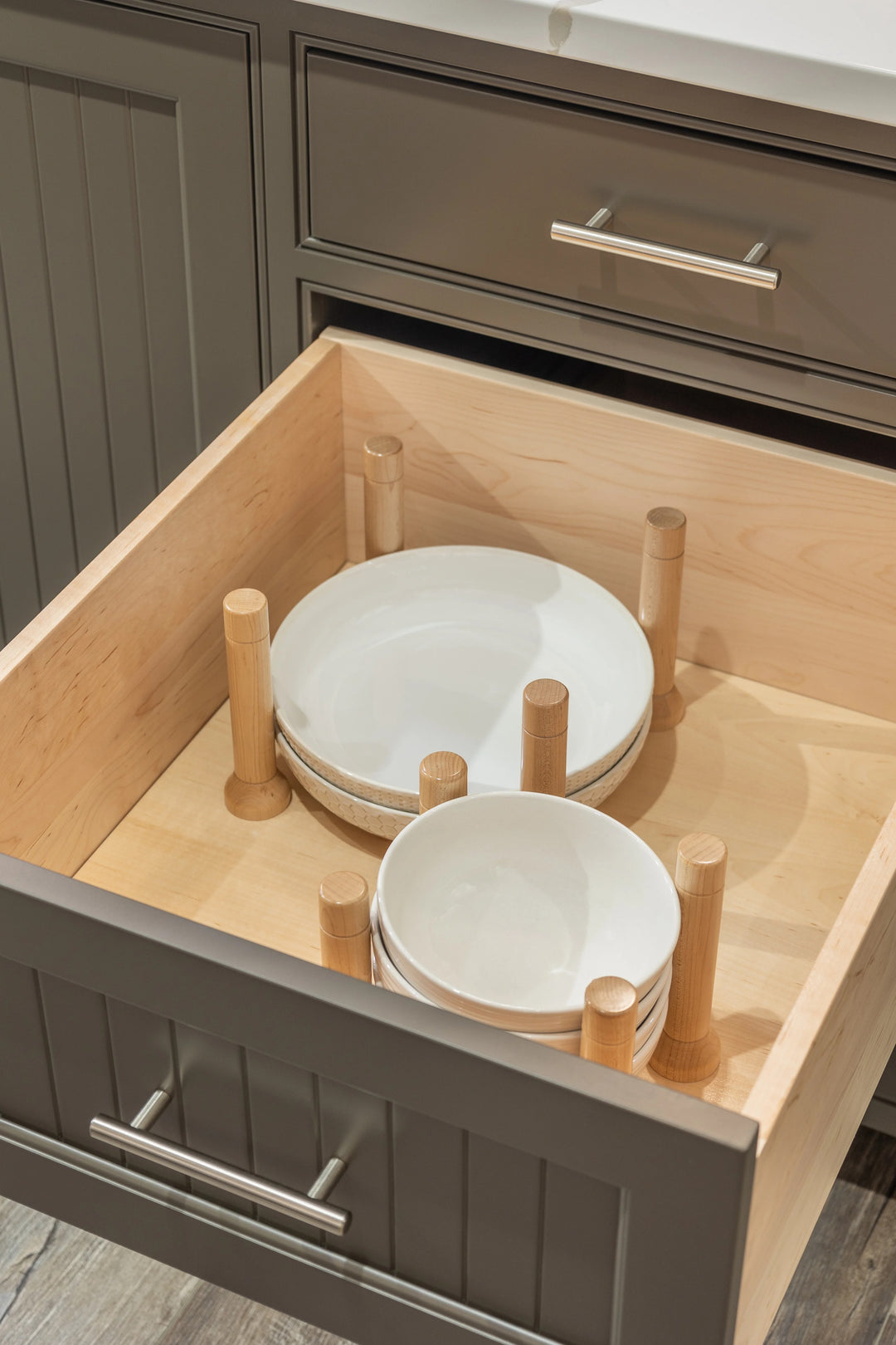 21" MagnaBase Deep Drawer Organizer installed in a kitchen cabinet