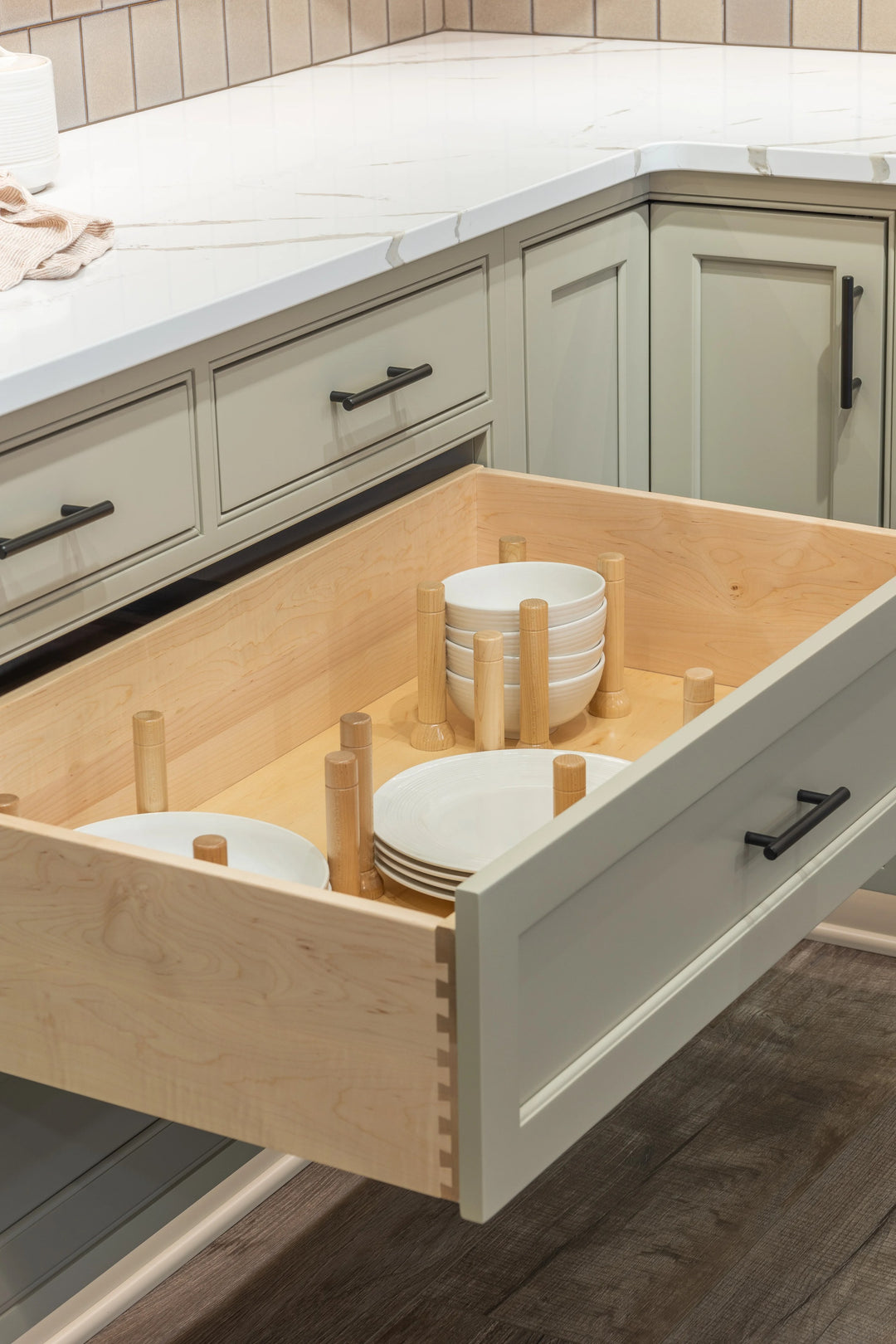 33" MagnaBase Deep Drawer Organizer installed in a kitchen cabinet
