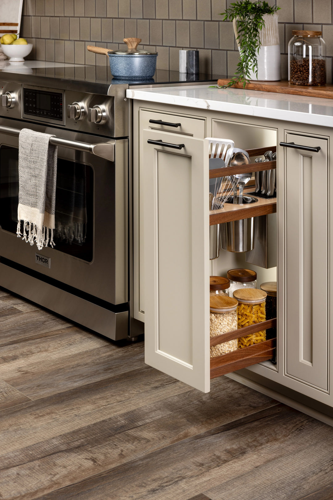9" Walnut Creek Pullout Canister Organizer with Knife Block installed in a kitchen cabinet