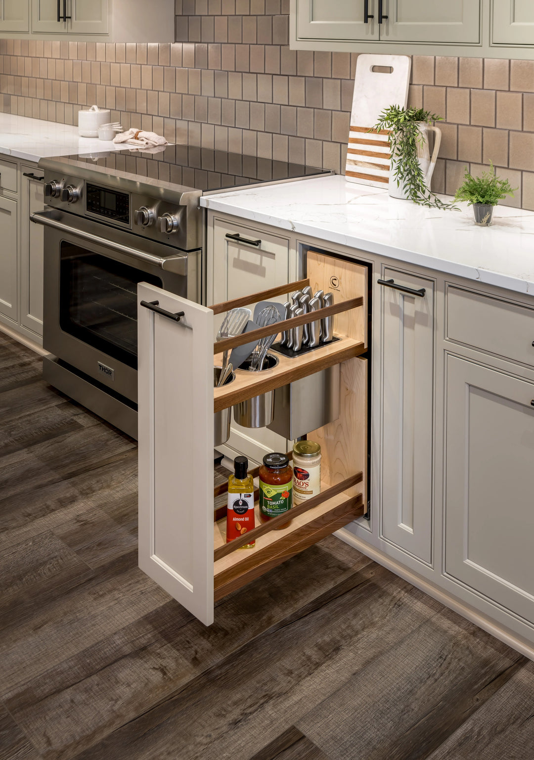 9" Walnut Creek Pullout Canister Organizer with Knife Block installed in a kitchen cabinet